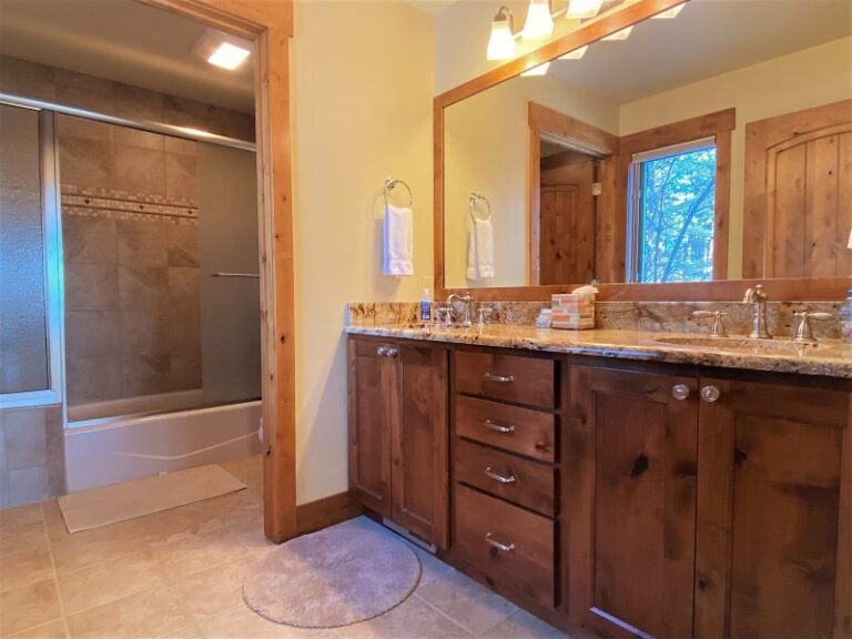 Whitefish resort town lake vacation rental master bath room.