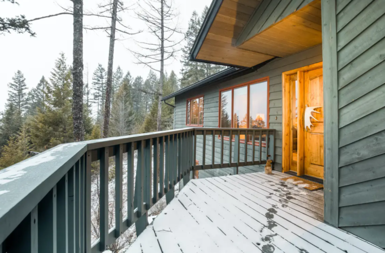 Front door and porch to house city of Whitefish lake vacation rental 