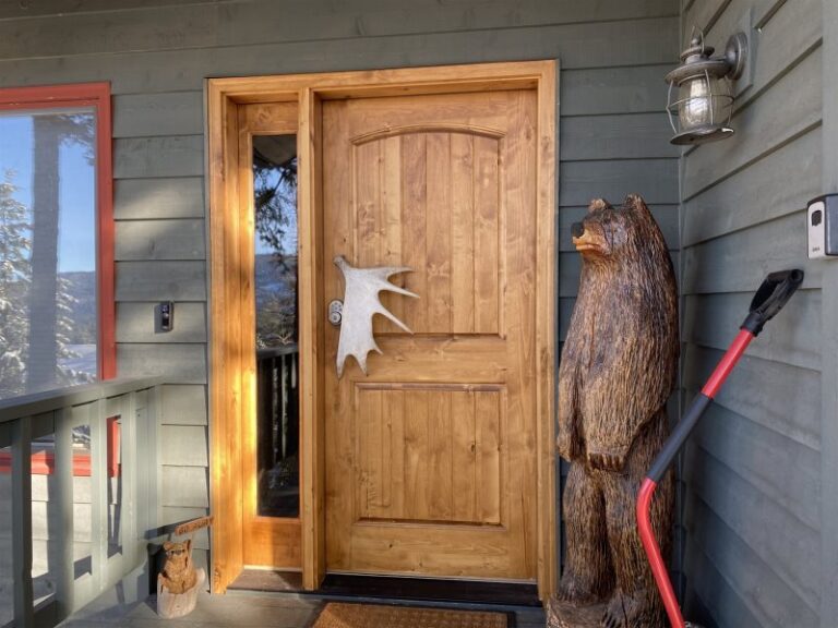 Front Door Whitefish lake vacation rental with bear